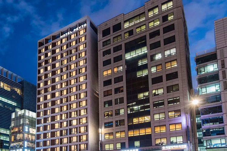 Hotel Peyto Samseong tower lit up at night